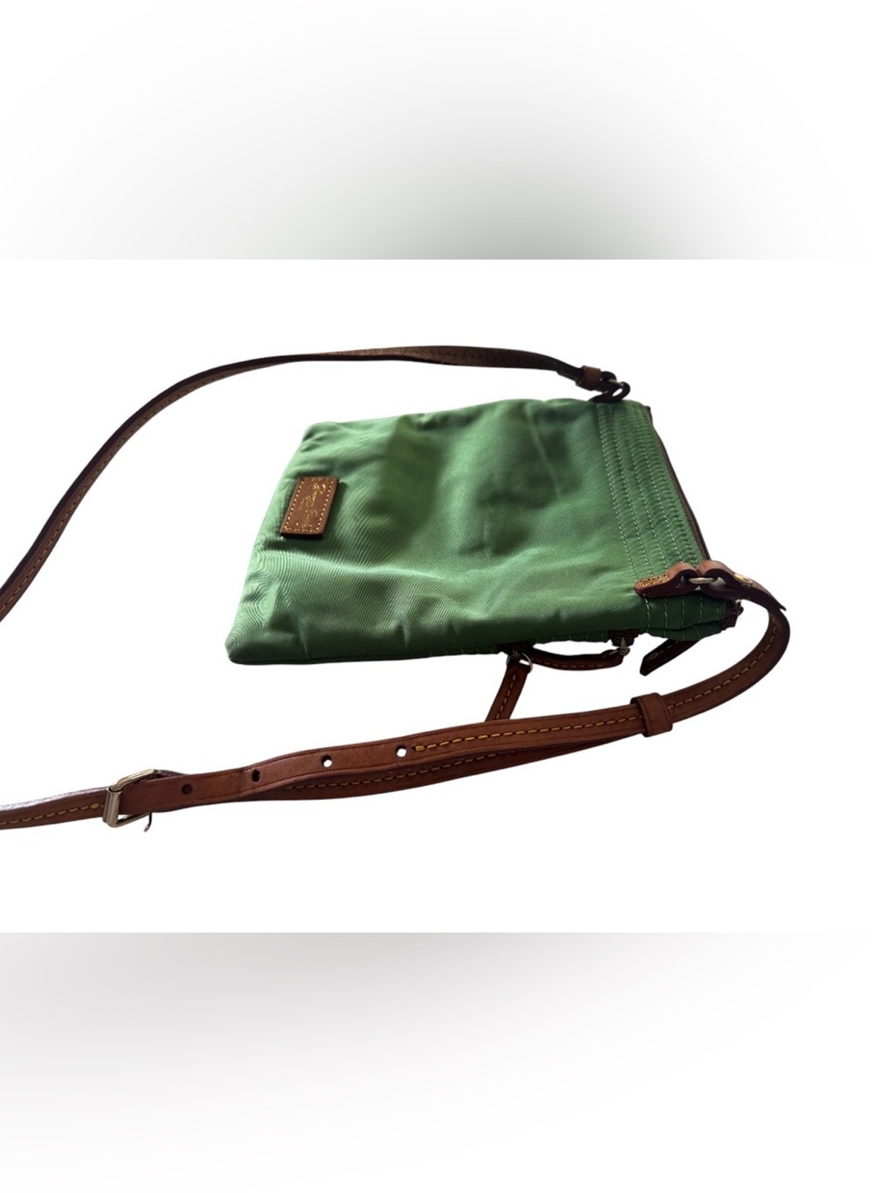 Dooney & Bourke Nylon North South Triple Zip Crossbody.Color: Kelly green nylon. - Picture 4 of 12